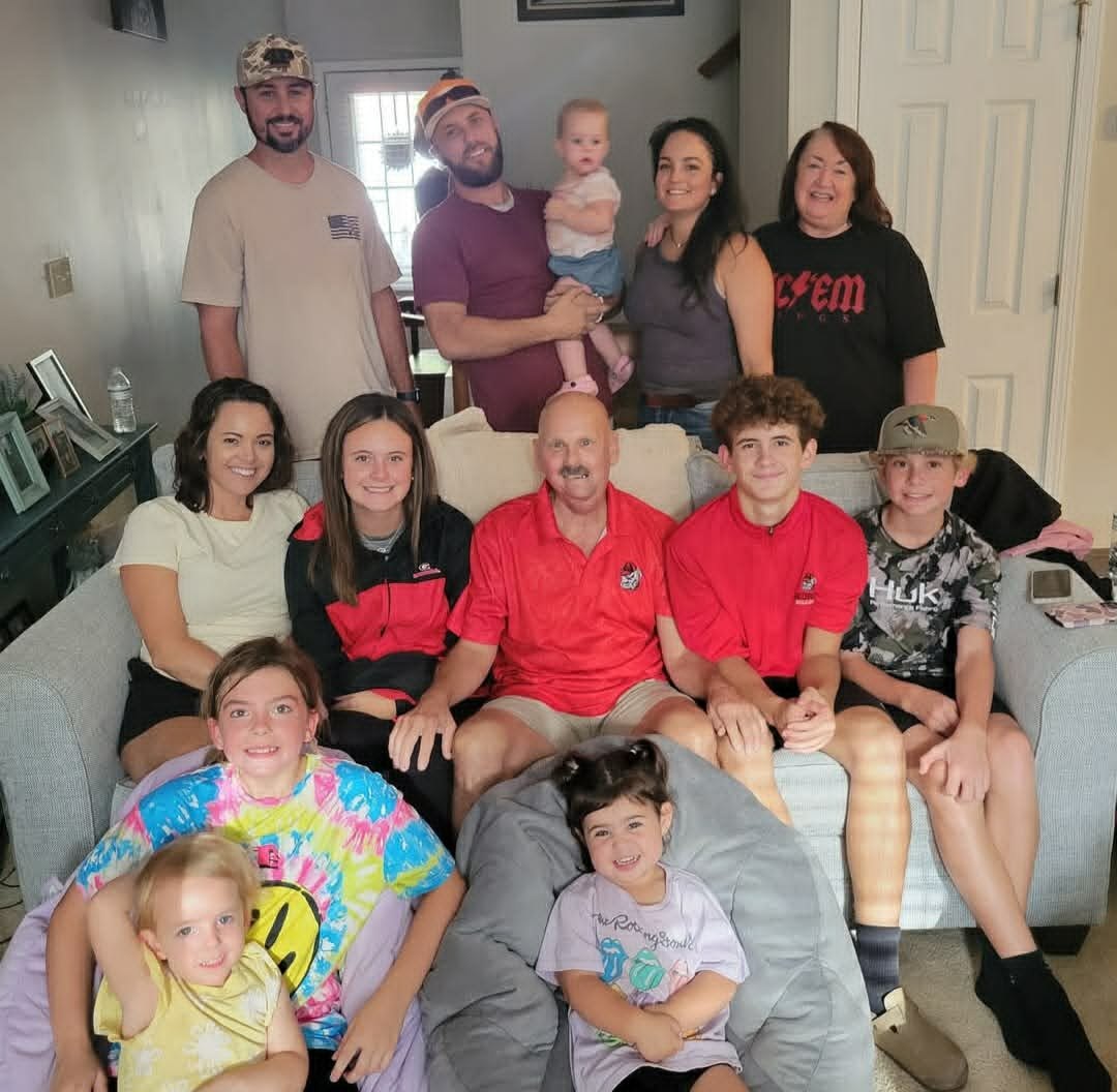 David surrounded by family at home