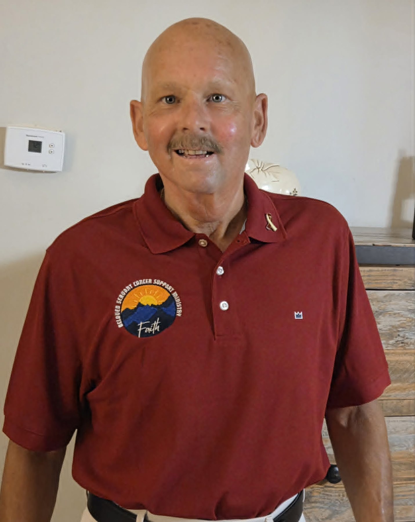 David wearing a Beloved Servant Cancer Support Ministry shirt